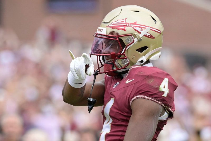Florida State Seminoles wide receiver Squirrel White (4) reacts after making a catch Aug. 30, 2025, against the Alabama Crimson Tide during the first half at Doak S. Campbell Stadium in Tallahassee, Florida. Mandatory Credit: Melina Myers-Imagn Images
