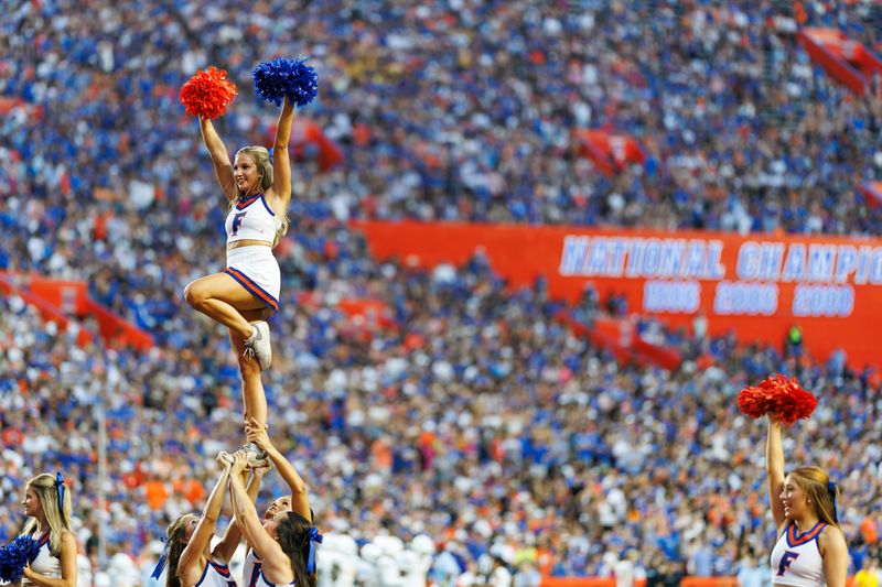 Aug 30, 2025; Gainesville, Florida, USA; A Florida Gators cheerleader performs during a timeout against the Long Island Sharks during the first half at Ben Hill Griffin Stadium. Mandatory Credit: Matt Pendleton-Imagn Images