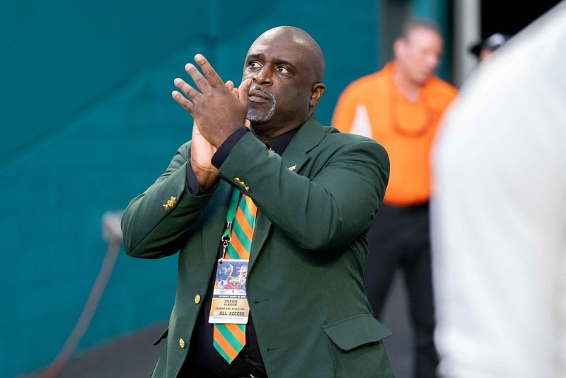 Florida A&M University Deputy Director of Athletics and Chief Operating Officer Travis Glasgow cheers on the FAMU Rattlers football team in Week 1 NCAA football versus Howard Bison in Orange Blossom Classic at Hard Rock Stadium in Miami Gardens, Florida, Saturday, Aug. 30, 2025.