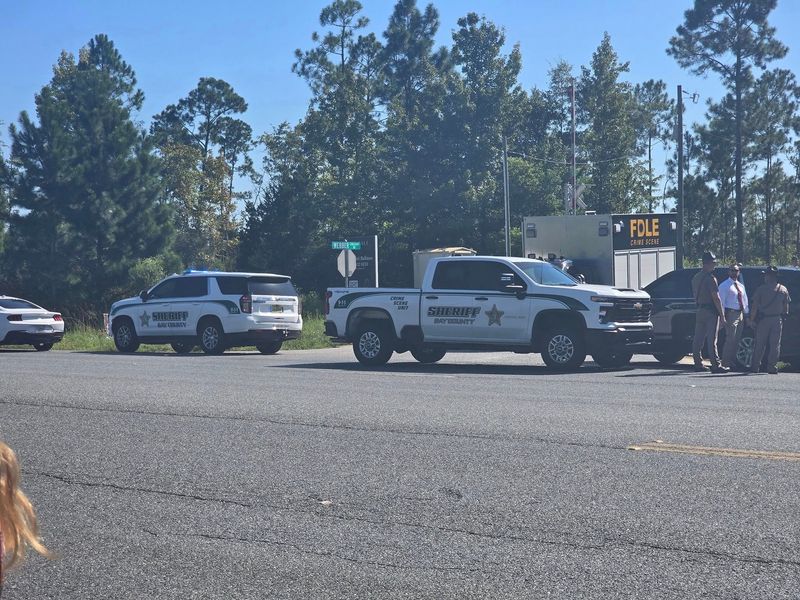 Bay County Sheriff's Office vehicles are staged near the scene of an officer-involved shooting in Fountain, Florida, on Sept. 3, 2025.