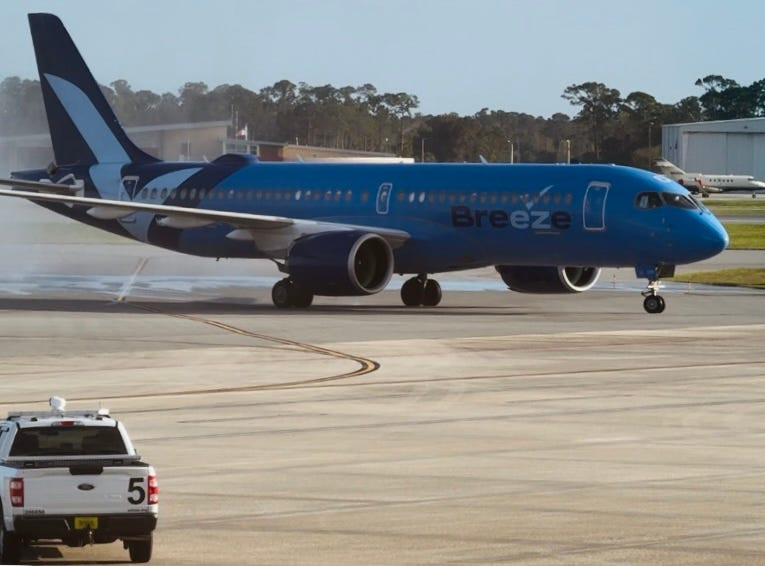 A Breeze Airways jetliner lands at Daytona Beach International Airport on Nov. 14, 2024. The discount airline began nonstop service here that day, starting with flights from Westchester County (White Plains), New York. It now offers twice-weekly nonstop flights to five destinations, with its launch of service Wednesdays and Saturdays to Akron/Canton, Ohio on Sept. 3, 2025. It also flies to Hartford, Connecticut, Providence, Rhode Island, and Raleigh/Durham, North Carolina.