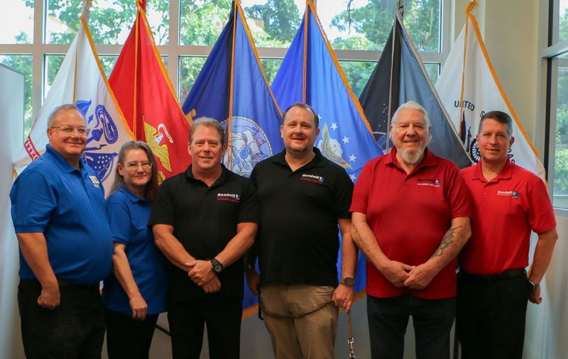 Goodwill Manasota’s Veterans Services team includes, from left, Thomas Rogers, Leanne Barnes, Randy Wright, Ryan Garner and Richard Burger, with president and CEO Donn Githens.