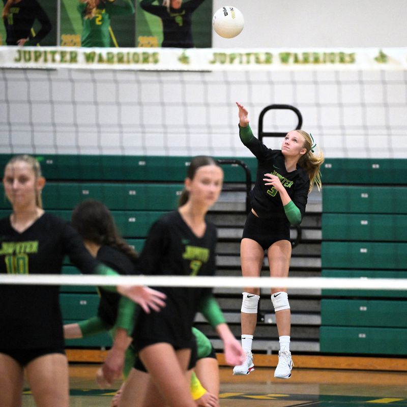 Jupiter's Emery Townsend with total serve concentration during a 3-1 win against Cardinal Newman on Sept. 3, 2025.