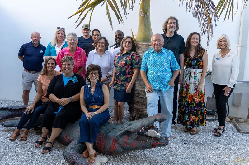 Back row: Wes Sammons, Alison Lee, Linda Scott, Shane Williams, Hollie Ray, Kathy Lindsey, Milton Banner, Sue Gromis, President Rick Gromis, Michael Staudt, Jessica Staudt and Elaine Jones. Front row: Arita Koehn, District Governor Marcia Gaedcke and Francine Figliolo