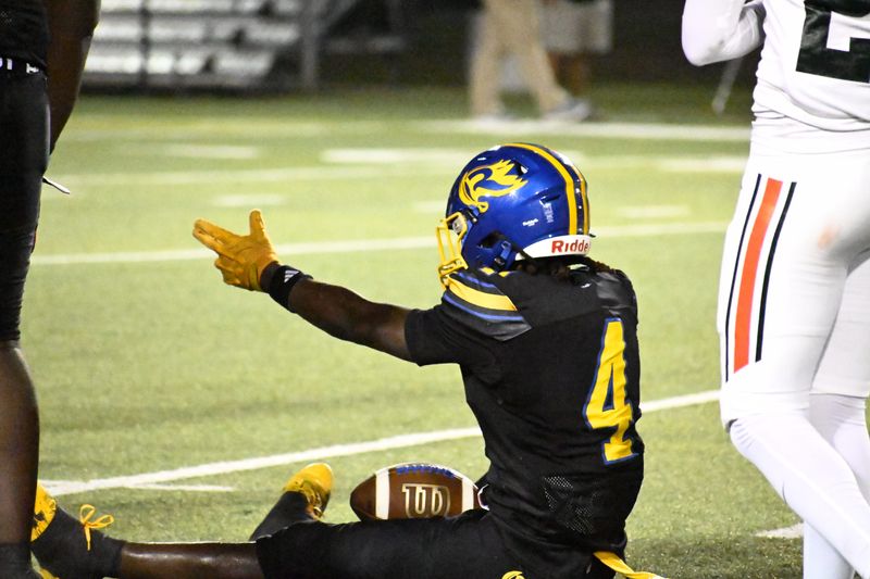 Rickards Raiders wide receiver Aaron Johnson Jr. signals a first down versus the Mosley Dolphins in a Week 3 FHSAA football matchup at Gene Cox Stadium in Tallahassee, Florida, Friday, Sept. 5, 2025.