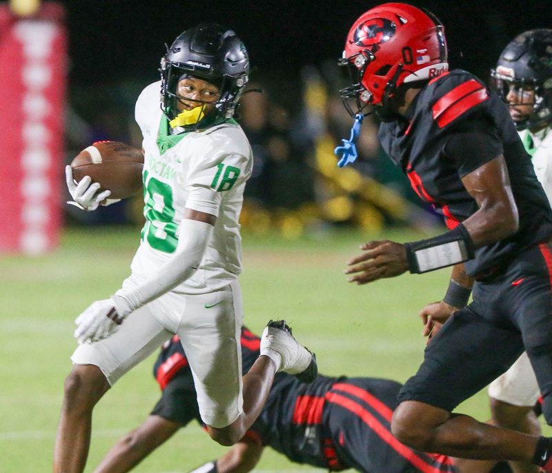 Choctaw CB Jordyn Long carries the ball during the Choctaw Crestview football game at Crestview.