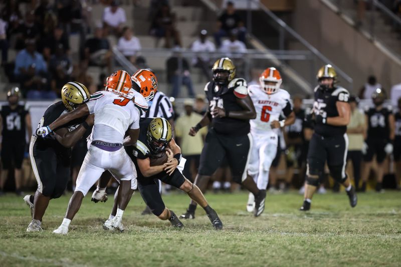 Buchholz Bobcats player Andrew Whittemore (9) runs into an Eastside Rams player during the first half of a football game between Buchholz High School and East Side High School at Citizens Field in Gainesville, FL on Friday, September 5, 2025. [Chris Watkins/Gainesville Sun]