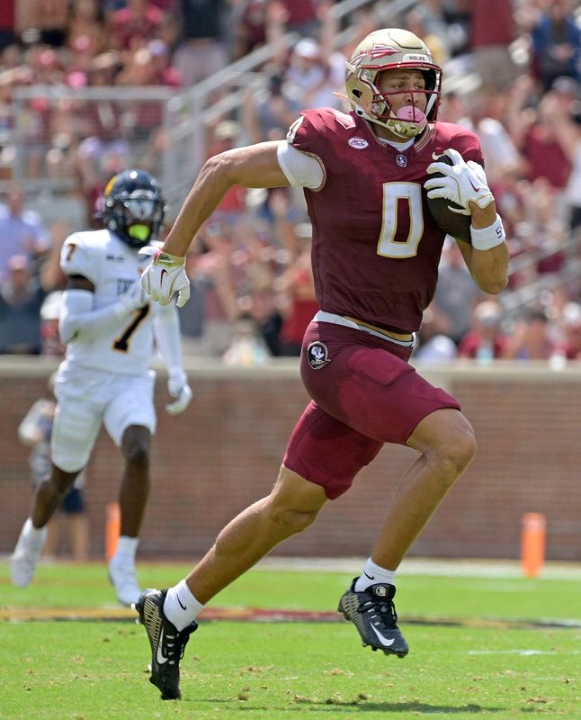 Florida State Seminoles wide receiver Duce Robinson (0) catches a touchdown during the first half Sept. 6, 2025, against the East Texas A&M at Doak S. Campbell Stadium in Tallahassee, Florida. Mandatory Credit: Melina Myers-Imagn Images