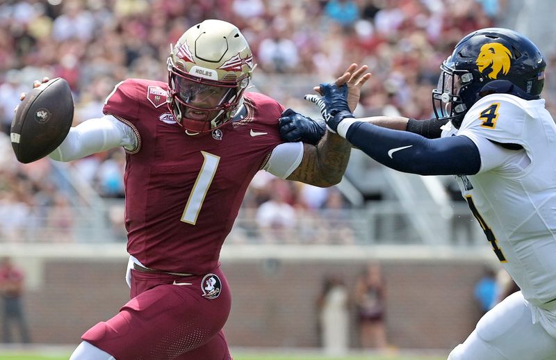 Florida State Seminoles quarterback Tommy Castellanos (1) runs the ball during the first half Sept. 6, 2025, against the East Texas A&M Lions at Doak S. Campbell Stadium in Tallahassee, Florida. Mandatory Credit: Melina Myers-Imagn Images