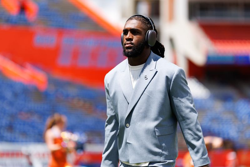 Sep 6, 2025; Gainesville, Florida, USA; Florida Gators linebacker Myles Graham (5) walks on the field during Gator Walk before a game against the South Florida Bulls at Ben Hill Griffin Stadium. Mandatory Credit: Matt Pendleton-Imagn Images