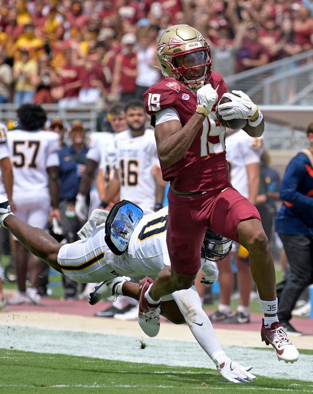 Florida State Seminoles wide receiver Micahi Danzy (19) runs the ball for a touchdown during the second half Sept. 6, 2025, against the East Texas A&M Lions at Doak S. Campbell Stadium in Tallahassee, Florida. Mandatory Credit: Melina Myers-Imagn Images