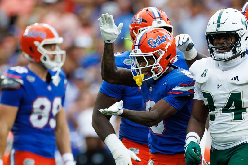 Sep 6, 2025; Gainesville, Florida, USA; Florida Gators wide receiver Vernell Brown III (8) gestures after a run against the South Florida Bulls during the first half at Ben Hill Griffin Stadium. Mandatory Credit: Matt Pendleton-Imagn Images