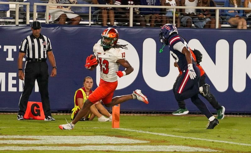 Florida A&M wide receiver Jamar Taylor (13) catches a touchdown pass during the second half of a 56-14 victory over Florida A&M at FAU Stadium on Saturday, Sept. 6, 2025, in Boca Raton, FL.