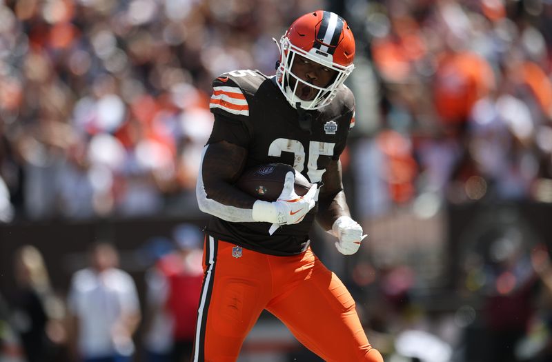 Sep 7, 2025; Cleveland, Ohio, USA; Cleveland Browns running back Raheim Sanders (35) reacts after scoring a touchdown during the second quarter against the Cincinnati Bengals at Huntington Bank Field. Mandatory Credit: Scott Galvin-Imagn Images