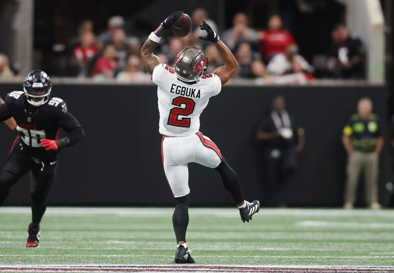 Sep 7, 2025; Atlanta, Georgia, USA; Tampa Bay Buccaneers wide receiver Emeka Egbuka (2) makes a catch against the Atlanta Falcons during the second quarter at Mercedes-Benz Stadium. Mandatory Credit: Brett Davis-Imagn Images