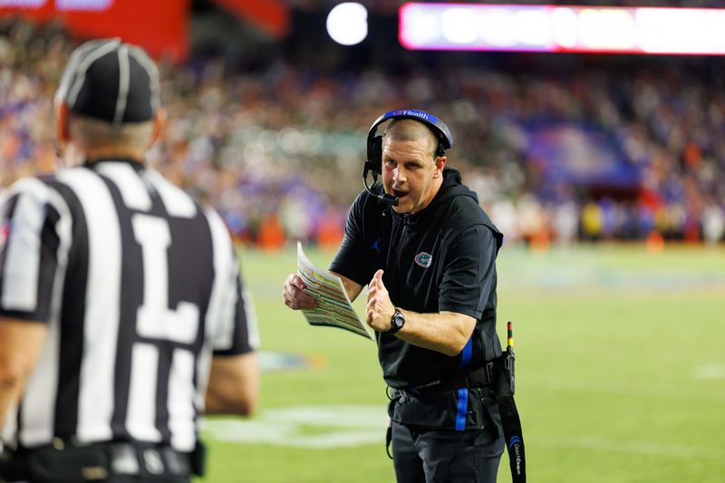 Sep 6, 2025; Gainesville, Florida, USA; Florida Gators head coach Billy Napier calls a timeout against the Florida Gators during the second half at Ben Hill Griffin Stadium. Mandatory Credit: Matt Pendleton-Imagn Images
