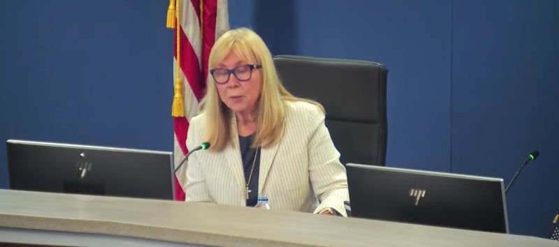 Newly appointed school board member Karen Rose chimes in during the discussion to relocate the district offices from the Landings during Tuesday's special meeting.