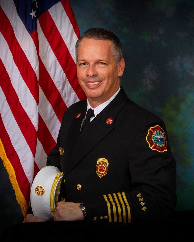 New Smyrna Beach Fire Chief Shawn VanDemark will retire in October 2025 after 27 years of service.