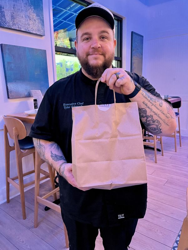 Chef Tyler Edwards is one of the forces behind FAM Burgers, a new ghost kitchen delivering through Uber Eats in Estero.