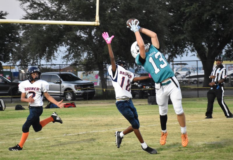 Destin's Jax O'Dell makes the catch from quarterback Joseph Cope and then takes it in for the score against the Bruner Spartans. Destin won 49-14.