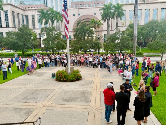 A candlelight prayer vigil was held Sept. 12 for Charlie Kirk at the Palm Beach Courthouse, 300 N. Dixie Highway, West Palm Beach. Kirk, 31, a prominent conservative commentator, was shot and killed Sept. 10 while speaking during an event at a college campus in Utah.