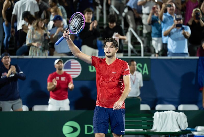 Sep 12, 2025; Delray Beach, FL, USA; Taylor Fritz of the United States reacts to winning his match against Jakub Mensik of Czechia in the second rubber of the Davis Cup tie between the USA and Czechia at Delray Beach Tennis Center. Mandatory Credit: Susan Mullane-Imagn Images