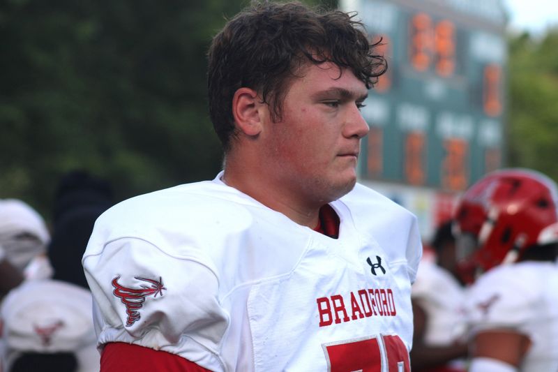 Bradford offensive lineman Bryce Daniels (77) listens as teammates prepare for a high school football game at Mandarin on Sept. 12, 2025. [Clayton Freeman/Florida Times-Union]