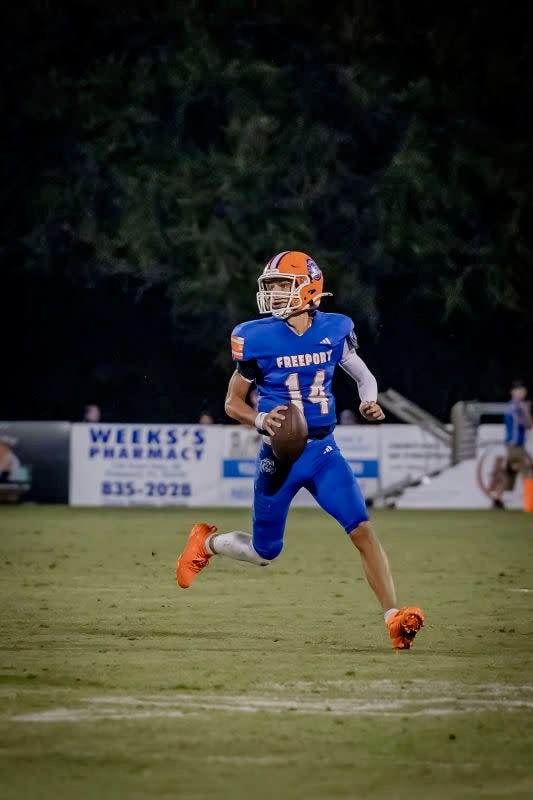 Freeport QB Carter Nunes looks for an open receiver downfield in a game earlier this year.