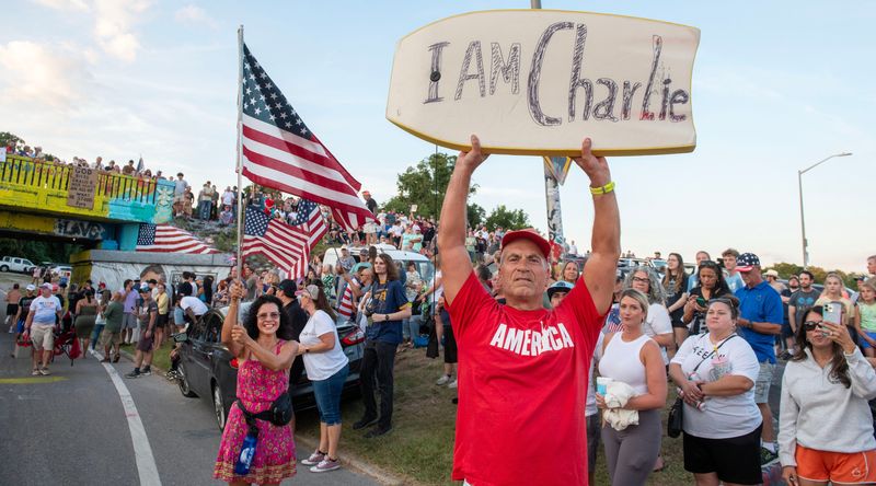 Hundreds of Charlie Kirk supporters celebrate the life of Charlie Kirk at Graffiti Bridge Sunday, Sept. 14, 2025 during a Candlelight Vigil in honor of Charlie Kirk.