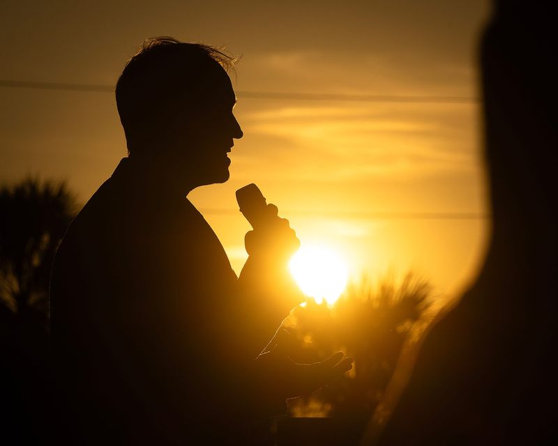 Tho Bishop, chairman of the Bay County Republican Party of Florida, delivers remarks during a candlelight vigil for Charlie Kirk Sept. 14, 2025. The conservative activist was murdered at a Utah university four days earlier. (Tyler Orsburn/News Herald)