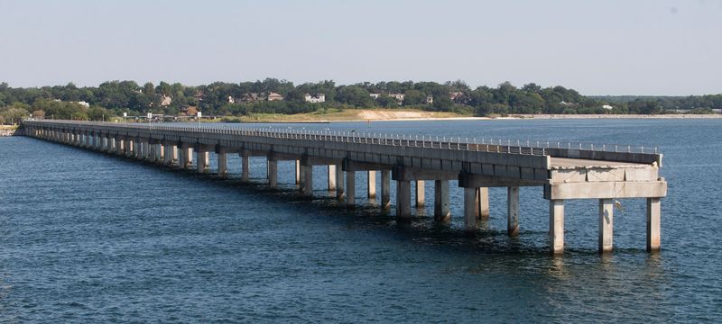 Escambia County is being asked to approve a $22,873,000 agreement with Russell Marine, LLC to demolish the old Pensacola Bay Fishing Bridge at Wayside Park and replace it. If approved, work is scheduled to begin Nov. 1 and be completed by next July.