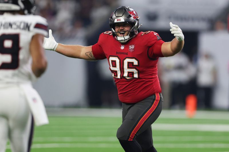 Sep 15, 2025; Houston, Texas, USA; Tampa Bay Buccaneers defensive tackle Greg Gaines (96) celebrates after a sack during the game against the Houston Texans at NRG Stadium. Mandatory Credit: Troy Taormina-Imagn Images