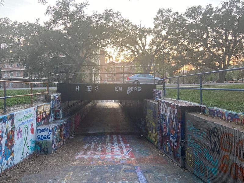 Close to Norman Hall at UF, someone wrote over the words "Charles James Kirk, Say His Name" and changed it to Heisenberg, alluding to a Breaking Bad reference.