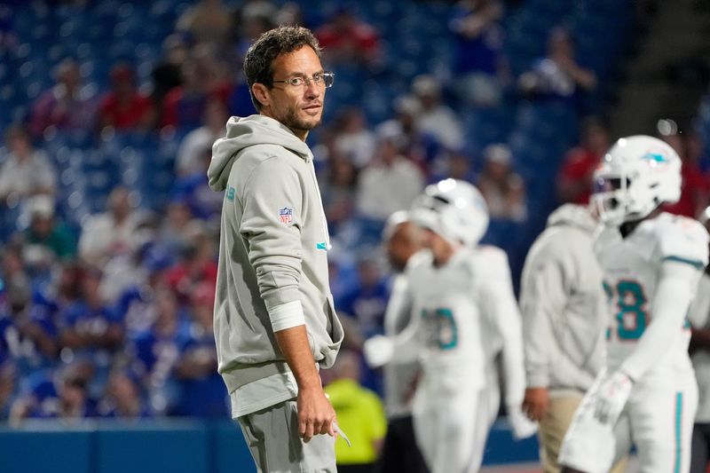 Sep 18, 2025; Orchard Park, New York, USA; Miami Dolphins head coach Mike McDaniel looks on before the game against the Buffalo Bills at Highmark Stadium. Mandatory Credit: Gregory Fisher-Imagn Images