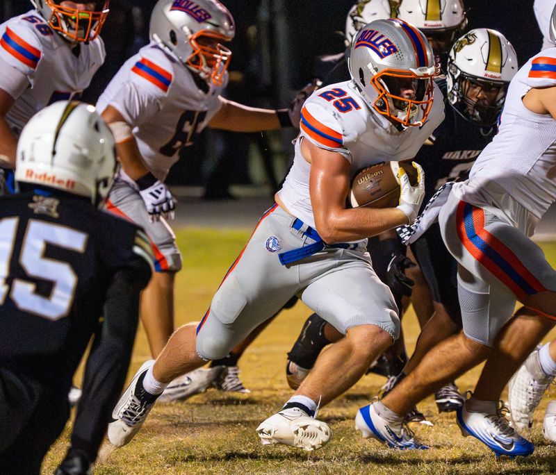 Bolles Bulldogs running back Xander Edwards (25) breaks for a second-quarter touchdown Sept. 19, 2025 at Oakleaf High School in Oakleaf Plantation, Florida.