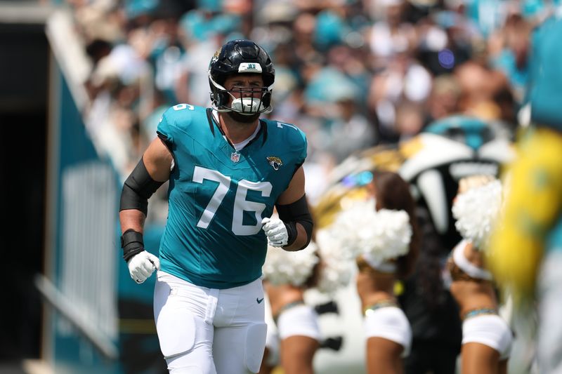Sep 7, 2025; Jacksonville, Florida, USA; Jacksonville Jaguars guard Ezra Cleveland (76) takes the field prior to a game against the Carolina Panthers at EverBank Stadium. Mandatory Credit: Nathan Ray Seebeck-Imagn Images