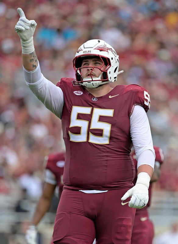 Sep 20, 2025; Tallahassee, Florida, USA; Florida State Seminoles offensive lineman Gunnar Hansen (55) celebrates a touchdown during the first half against the Kent State Golden Flashes at Doak S. Campbell Stadium. Mandatory Credit: Melina Myers-Imagn Images