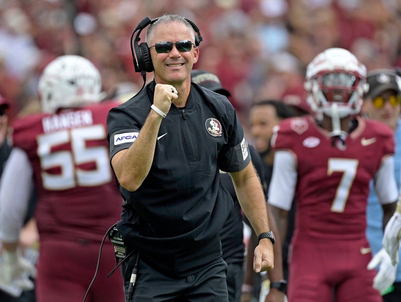 Sep 20, 2025; Tallahassee, Florida, USA; Florida State Seminoles head coach Mike Norvell reacts after a touchdown during the first half against the Kent State Golden Flashes at Doak S. Campbell Stadium. Mandatory Credit: Melina Myers-Imagn Images