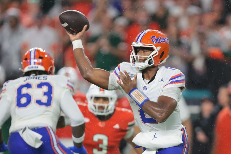 Sep 20, 2025; Miami Gardens, Florida, USA; Florida Gators quarterback DJ Lagway (2) passes the football against the Miami Hurricanes during the first quarter at Hard Rock Stadium. Mandatory Credit: Sam Navarro-Imagn Images