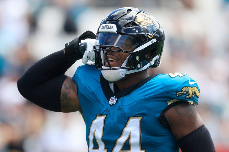 Jacksonville Jaguars defensive end Travon Walker (44) flexes after a sack on Houston Texans quarterback CJ. Stroud (7) during the first quarter of an NFL football matchup at EverBank Stadium, Sunday, Sept. 21, 2025, in Jacksonville, Fla. [Corey Perrine/Florida Times-Union]