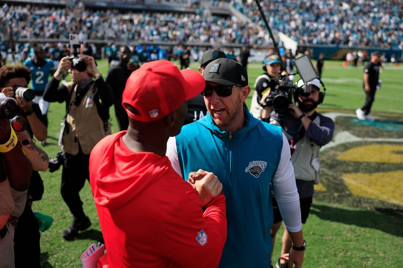 Jacksonville Jaguars head coach Liam Coen shakes hands with Houston Texans head coach DeMeco Ryans mid-field after the game of an NFL football matchup at EverBank Stadium, Sunday, Sept. 21, 2025, in Jacksonville, Fla. The Jaguars defeated the Texans 17-10. [Corey Perrine/Florida Times-Union]