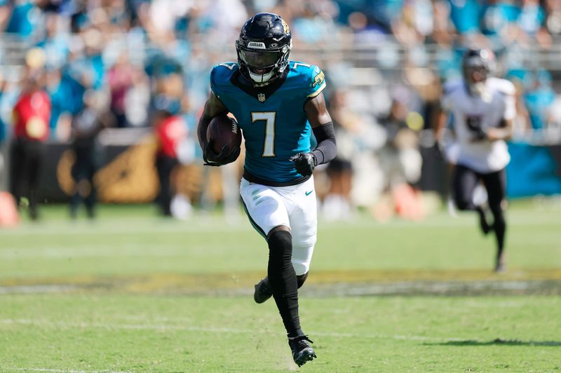 Jacksonville Jaguars wide receiver Brian Thomas Jr. (7) sprints on a catch and run during the fourth quarter of an NFL football matchup at EverBank Stadium, Sunday, Sept. 21, 2025, in Jacksonville, Fla. The Jaguars defeated the Texans 17-10. [Corey Perrine/Florida Times-Union]