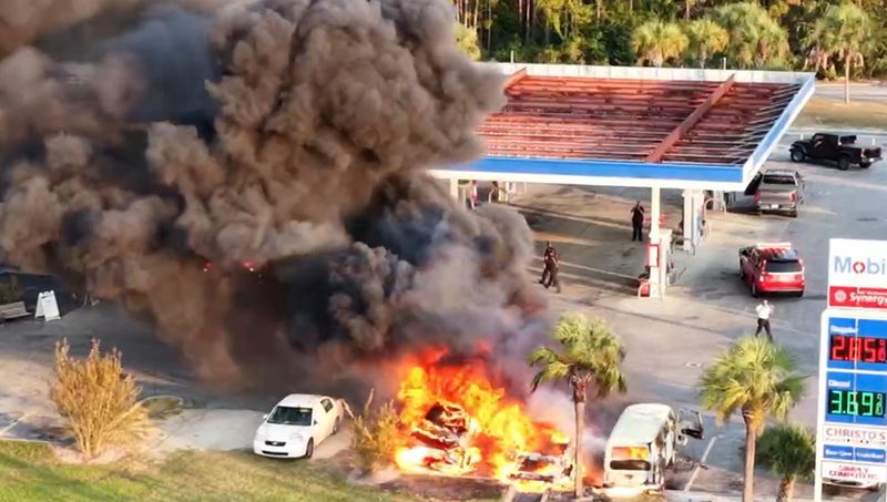 Cars catch fire outside of a restaurant in Panama City Beach on Sept. 19.