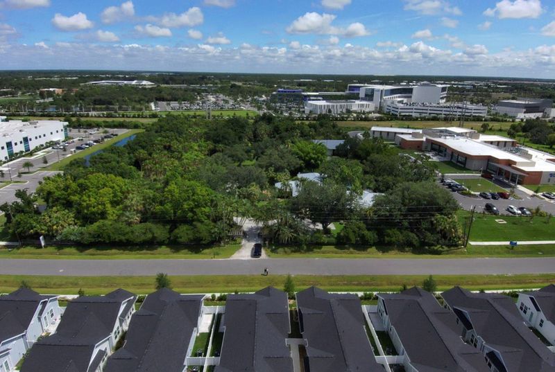 This aerial image shows the location of a proposed medical office building and ambulatory surgery center at 2695 Curry Lane. It is sandwiched between an office building and a private rehabilitation hospital and south of the Sarasota Memorial Hospital Venice campus.