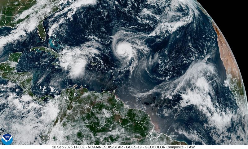 Satellite imagery shows Hurricane Humberto and Invest 94L in the Atlantic basin on Thursday, Sept. 26, 2025.