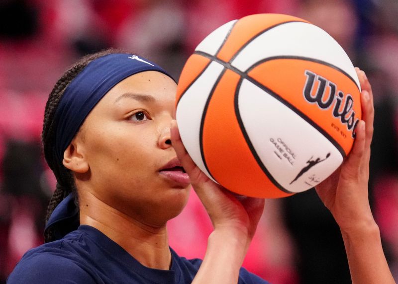 Indiana Fever forward Makayla Timpson (21) warms up before a game against the Las Vegas Aces on Sunday, Sept. 28, 2025, at Gainbridge Fieldhouse in Indianapolis.