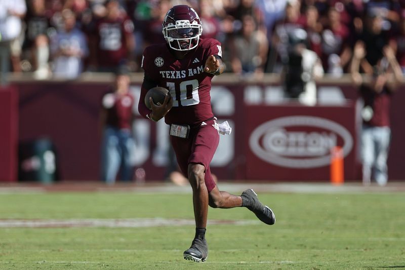 Sep 27, 2025; College Station, Texas, USA; Texas A&M Aggies quarterback Marcel Reed (10) runs with the ball during the second quarter against the Auburn Tigers at Kyle Field. Mandatory Credit: Troy Taormina-Imagn Images
