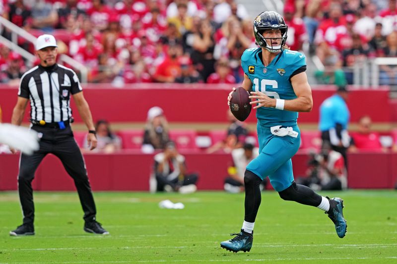 Sep 28, 2025; Santa Clara, California, USA; Jacksonville Jaguars quarterback Trevor Lawrence (16) drops back for a pass during the first half against the San Francisco 49ers at Levi's Stadium. Mandatory Credit: Darren Yamashita-Imagn Images