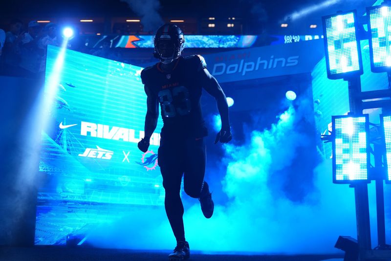 Sep 29, 2025; Miami Gardens, Florida, USA; Miami Dolphins tight end Darren Waller (83) takes the field before the game against the New York Jets at Hard Rock Stadium. Mandatory Credit: Rich Storry-Imagn Images