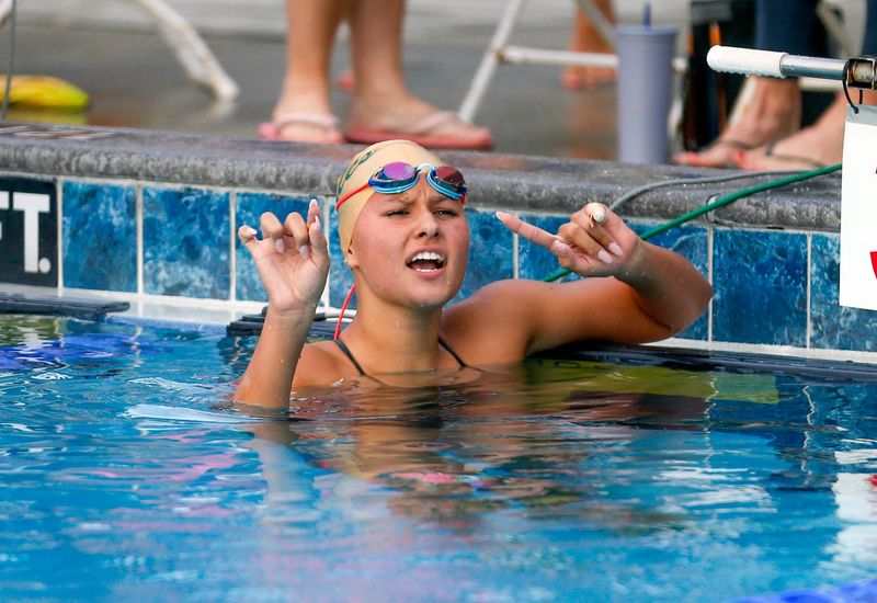 George Jenkins senior Vanessa Calva reacts after winning the 200 freestryle on Thursday in the City of Lakeland Championships at Gandy Pool.